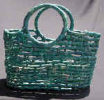 woman woven handbag by art export bali indonesia