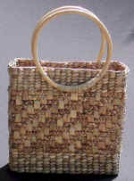 woman woven handbag by art export bali indonesia