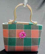 woman woven handbag by art export bali indonesia