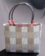 woman woven handbag by art export bali indonesia