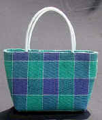 woman woven handbag by art export bali indonesia