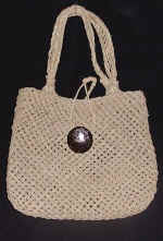 woman woven handbag by art export bali indonesia