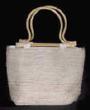 woman woven handbag by art export bali indonesia