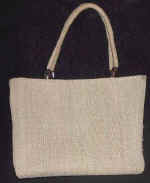 woman woven handbag by art export bali indonesia