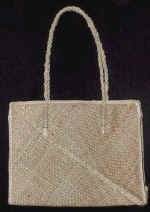 woman woven handbag by art export bali indonesia