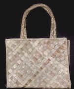 woman woven handbag by art export bali indonesia