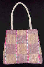 woman woven handbag by art export bali indonesia