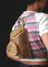 woman woven handbag by art export bali indonesia