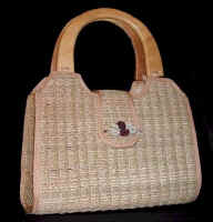 woman woven handbag by art export bali indonesia