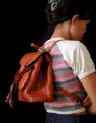 woman leather bag by art export bali indonesia