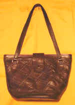 woman leather bag by art export bali indonesia