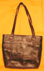 woman leather bag by art export bali indonesia