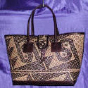 woman woven handbag by art export bali indonesia