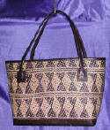 woman woven handbag by art export bali indonesia