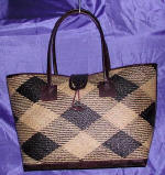 woman woven handbag by art export bali indonesia