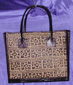 woman woven handbag by art export bali indonesia