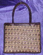 woman woven handbag by art export bali indonesia