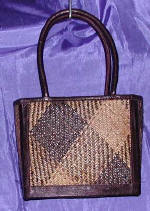 woman woven handbag by art export bali indonesia