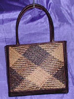 woman woven handbag by art export bali indonesia