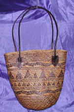 woman woven handbag by art export bali indonesia