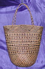 woman woven handbag by art export bali indonesia