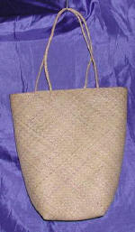 woman woven handbag by art export bali indonesia