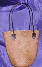 woman woven handbag by art export bali indonesia