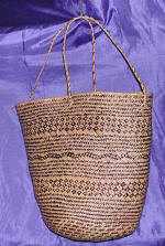 woman woven handbag by art export bali indonesia