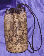 woman woven handbag by art export bali indonesia