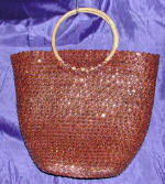 woman woven handbag by art export bali indonesia