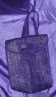 woman woven handbag by art export bali indonesia