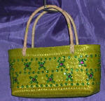 woman woven handbag by art export bali indonesia