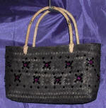 woman woven handbag by art export bali indonesia