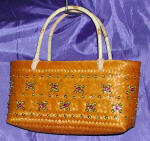 woman woven handbag by art export bali indonesia