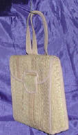 woman woven handbag by art export bali indonesia