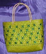 woman woven handbag by art export bali indonesia