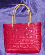 woman woven handbag by art export bali indonesia