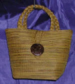 woman woven handbag by art export bali indonesia