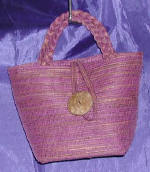 woman woven handbag by art export bali indonesia