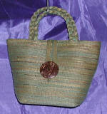 woman woven handbag by art export bali indonesia