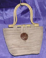 woman woven handbag by art export bali indonesia