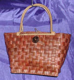 woman woven handbag by art export bali indonesia