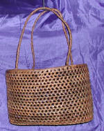 woman woven handbag by art export bali indonesia