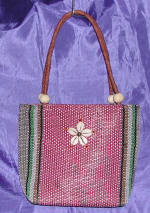 woman woven handbag by art export bali indonesia