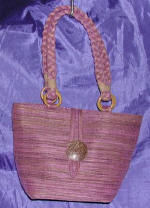 woman woven handbag by art export bali indonesia