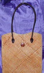 woman woven handbag by art export bali indonesia