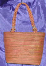 woman woven handbag by art export bali indonesia