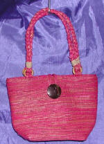 woman woven handbag by art export bali indonesia