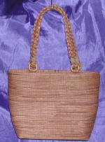 woman woven handbag by art export bali indonesia