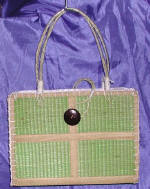 woman woven handbag by art export bali indonesia